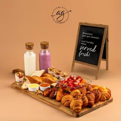 This is my idea of the perfect start to the day. My French breakfast platter is a feast for the eyes and the appetite, featuring a selection of fresh viennoiseries, fruits, yogurt, and more. It’s made for sharing, but I won't blame you if you don't want to.