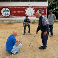 Measuring out the space for hitting bays and a short game area. This grassroots work is essential for sourcing new talent and making golf accessible.
