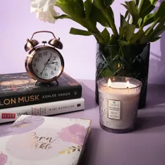 Relax and unwind with our Bulgarian Lavender two-wick candle. Poured into an engraved, hand-cut glass vessel, this candle is perfect for creating a calming ambiance for your evening wind-down routine.