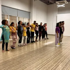 A behind-the-scenes shot from one of our Bollywood workshops. These events are not just about learning steps, but also about connecting with fellow dancers and having a great time.