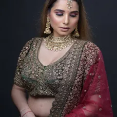 The profile view highlights the intricate details of the hair and makeup. We teach techniques for long-lasting wear, ensuring the bride looks fresh and radiant throughout the entire event.