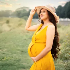 Motherhood is a journey filled with countless emotions. The serene beauty of the golden hour blended with the elegance of this stunning mom-to-be creates a story of joy.
