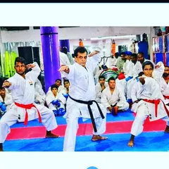 My guru, Hanshi Bharat Sharma Sir, leading a training session. His direct instruction in fundamental stances and techniques forms the core of our academy's success.