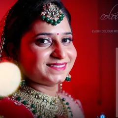A colorful and happy portrait of a bride from a Punjabi wedding, perfect for an album cover or feature page.