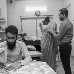 In my studio, I personally oversee the draping and fitting process to ensure every garment is tailored to perfection.