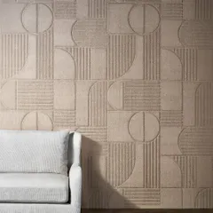 A bold, large-scale geometric pattern, thoughtfully crafted in 3D. This sound-absorbing and stain-repellent wallcovering combines modern design with functionality, shown here in a soft, neutral tone.