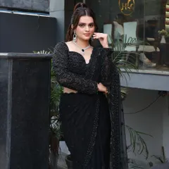 For a chic reception or sangeet, I crafted this elegant look featuring a high ponytail and sophisticated makeup. The focus is on sharp, defined features and a matte finish that lasts all night.