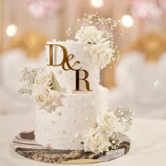 A classic two-tier engagement cake that’s all about timeless elegance. I adorned this beauty with delicate pearls and fresh white roses, creating a romantic and sophisticated centerpiece that tastes as good as it looks.