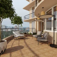 The balcony features a mix of modern outdoor furniture, from sleek wireframe chairs to a cushioned rocker, all chosen for comfort and durability. Large planters with trees bring lush greenery to this high-rise oasis.