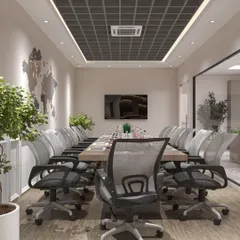 A conference room designed for global conversations, featuring a world map accent wall. The space combines professional aesthetics with biophilic elements like indoor plants to create a refreshing and productive meeting environment.