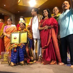 Posing with my award, a symbol of a long and fulfilling career in music. It is a joy to share these moments with the people who have been part of the journey.
