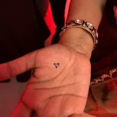Look closer. Sometimes the most magical things are hidden in plain sight, like a heart that appears on someone's palm when they least expect it.