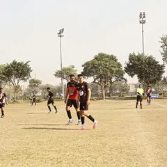An action shot from our Gameday 1 fixture in the Super League, with players walking the pitch during a break.