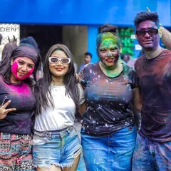 A group of friends smiling through the Holi colors. It was a day of pure joy and celebration.