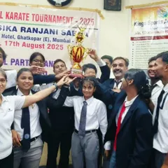 A moment of immense pride for our academy. My students celebrate a major victory, holding the team trophy high at the 16th State Level Karate Tournament. We train champions.