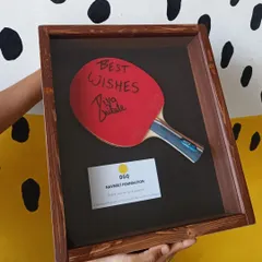 We also crafted this unique wooden shadow box to hold a table tennis paddle autographed by the young star Diya Chitale, another talented athlete supported by OGQ.