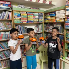 Exploring the science of sound. These boys are proudly showing off the tonoscopes they made, a device that allows them to "see" sound vibrations.
