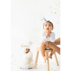 I can't believe my baby is already 6 months old. This was from his half-birthday photoshoot, and he's looking at the cloud cake I made just for him.