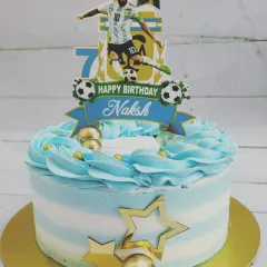For the little football fan in your life, I designed this Messi themed cake. It features a topper of the football star, along with stars and a custom name banner, all in the colors of the Argentinian flag.
