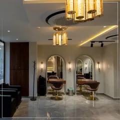 A look inside my Srinagar salon. The interior features elegant styling stations with plush chairs and perfect lighting, creating a sophisticated and comfortable atmosphere for your transformation.