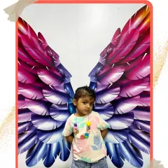 A little angel with a shy but sweet pose. We love capturing these candid moments that show the unique personality of each child.
