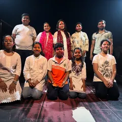 A group photo of our students after their energetic Holi performance, showcasing our community spirit.