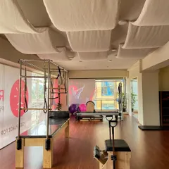 A look at our specialized equipment, including the Cadillac and Wunda chair. These pieces allow for a vast range of exercises, from rehabilitation to advanced athletic conditioning.