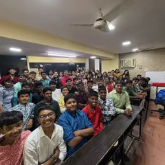 The entire class group, united in celebration. Events like our annual pooja reinforce the sense of community and family that we cherish at our coaching institute.