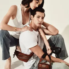 A tender moment captured in the studio for Kompanero. This image showcases the brand's versatile bags in a lifestyle context, blending commercial appeal with a touch of human emotion.