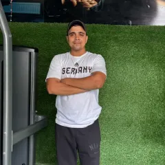 A posed shot in the gym. I am always ready for the next challenge.