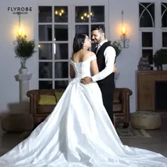 Another angle of this beautiful white ball gown, showing the corset back and the full, flowing skirt. It’s a look straight out of a fairytale, available for you to rent.