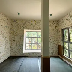 The completed doodle room, with whimsical patterns covering every wall. The design was done free-hand to give it a spontaneous and playful feel.