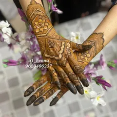 A striking design featuring a large floral motif in the center, with detailed patterns on the fingers and a cuff at the wrist.
