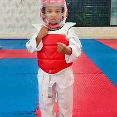 It's never too early to start building confidence. We welcome kids as young as two and a half, providing them with a safe and fun introduction to Taekwondo. This little warrior is geared up and ready to learn.