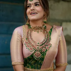 A happy, smiling portrait of my client. The intricate details of the choker and haram are clearly visible here.