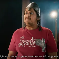 This character's "Trust me, I'm an engineer" t-shirt was a specific choice to build his quirky persona within the Casio ad's storyline. It’s a great example of how a single wardrobe piece can add a layer of personality and humor.
