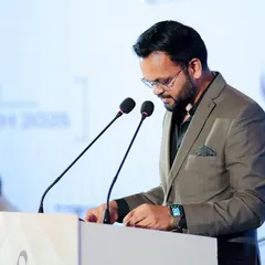 Focused on the script during a formal corporate show. Preparation is key to a flawless event, and I make sure every detail is covered before I step onto the stage.