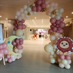 I designed this balloon arch to serve as the entrance for the Lion King themed party. The colors and character cutouts match the main stage decor perfectly.