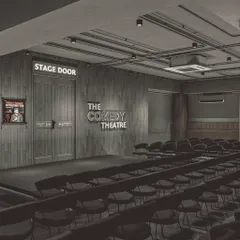 A glimpse into The Comedy Theatre, a unique venue we designed to blend the intimacy of a comedy club with the relaxed vibe of a café. The moody, raw interiors are balanced with warm lighting to ensure the focus is always on the performance.