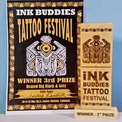 A closer look at our 3rd prize trophy and certificate from the Ink Buddies Tattoo Festival. We are grateful for the recognition of our hard work and dedication.