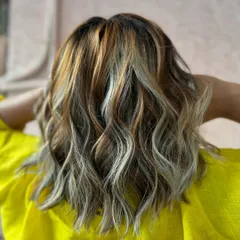 Extra sass with this blonde burst. I added a mix of platinum and warm blonde highlights to this bob for a multi-tonal, high-contrast look.