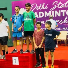 Our young champions on the podium at the Delhi State Badminton Championships. This picture captures the winners of the Boys Doubles U-13, Rajas Sharma and Vatsal Vedansh, celebrating their victory.