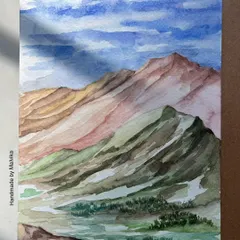 I often return to the mountains in my paintings. This watercolor piece captures the feeling of a clear day in the Himalayas, with layers of pink and green hills under a vast blue sky. It’s a moment of peace, painted from memory and available as a print.