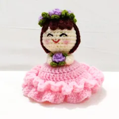 This reversible bouquet doll is two gifts in one. It starts as a beautiful floral bouquet and flips inside out to reveal an adorable doll in a pink frilly dress with a flower crown.