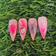 More beautiful student work. This set features a vibrant pink base with gold foil, 3D flowers, and delicate floral painting.
