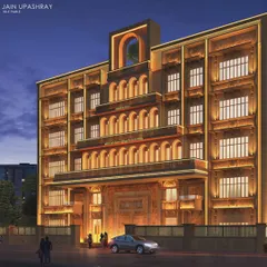 A render of the Jain Upashray in Vile Parle, Mumbai. This design is a modern interpretation of cultural heritage, drawing inspiration from the Sammed Shikharji Jain Temple. The illuminated facade at night highlights its intricate details and establishes it as a spiritual landmark.
