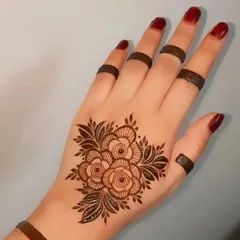 A simple yet stunning floral bouquet on the back of the hand. This kind of minimalist design is very popular for parties and casual events.