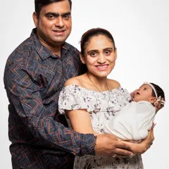 Another take from a classic family studio session, capturing the pure happiness of new parents. I provide gentle guidance to ensure you look natural and feel comfortable.