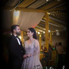 A classic engagement portrait of a couple sharing a look of love. We capture these moments during your pre-wedding functions, ensuring you have beautiful memories from every step of your journey.