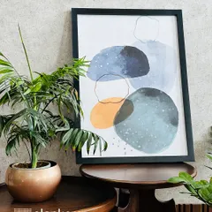 This abstract watercolor print, with its soothing blue and orange tones, is another example of the custom-framed art I provide to add a refined and personal touch to any room.